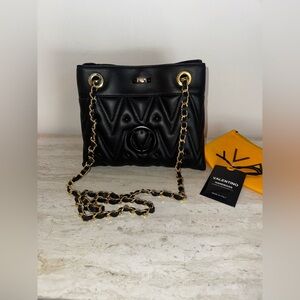 VALENTINO BY MARIO VALENTINO
Rita Studs Shoulder Bag